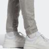 imageadidas Mens Essentials Logo Tapered Badge SweatpantsMedium Grey Heather