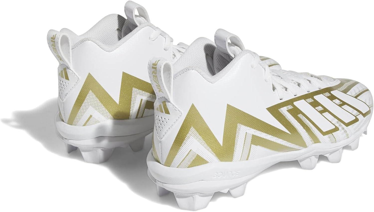 imageadidas UnisexChild Freak Spark Md 23 Inline Football Cleats ShoeWhiteWhiteGold Metallic
