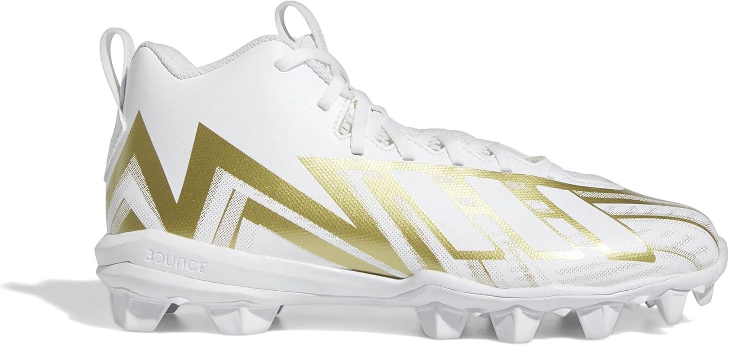 imageadidas UnisexChild Freak Spark Md 23 Inline Football Cleats ShoeWhiteWhiteGold Metallic