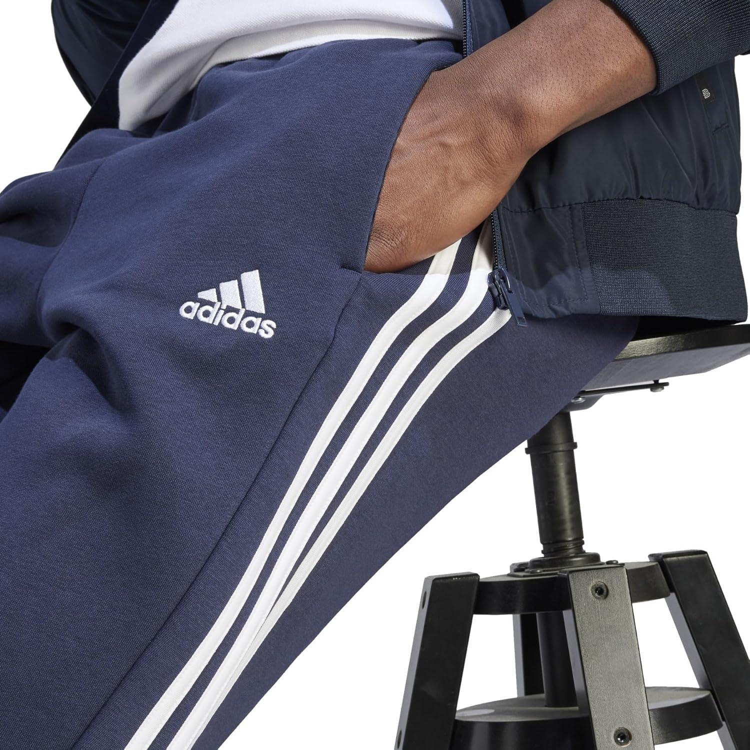 imageadidas Mens Essentials 3Stripes Fleece Open Hem PantsInk