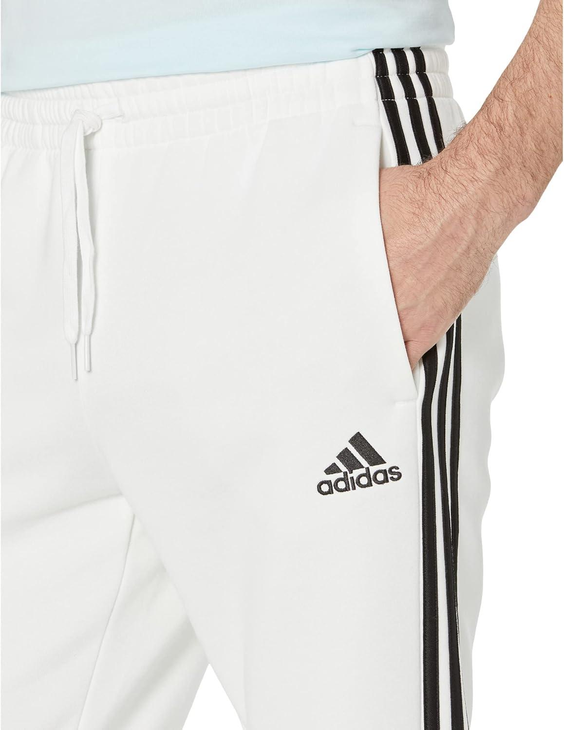 imageadidas Mens Essentials Fleece Tapered Cuff 3Stripes PantsWhiteBlack