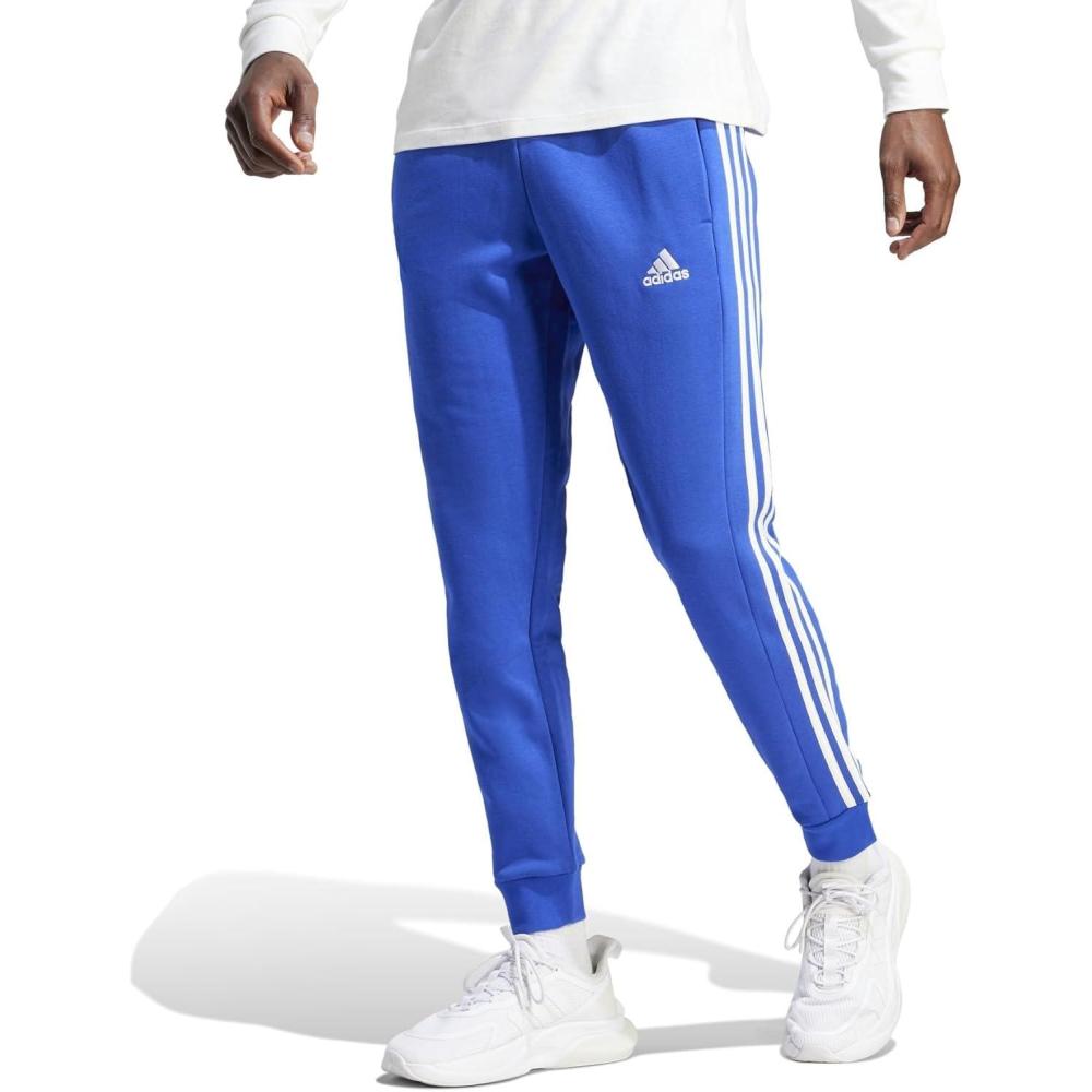 imageadidas Mens Essentials Fleece Tapered Cuff 3Stripes PantsSemi Lucid Blue