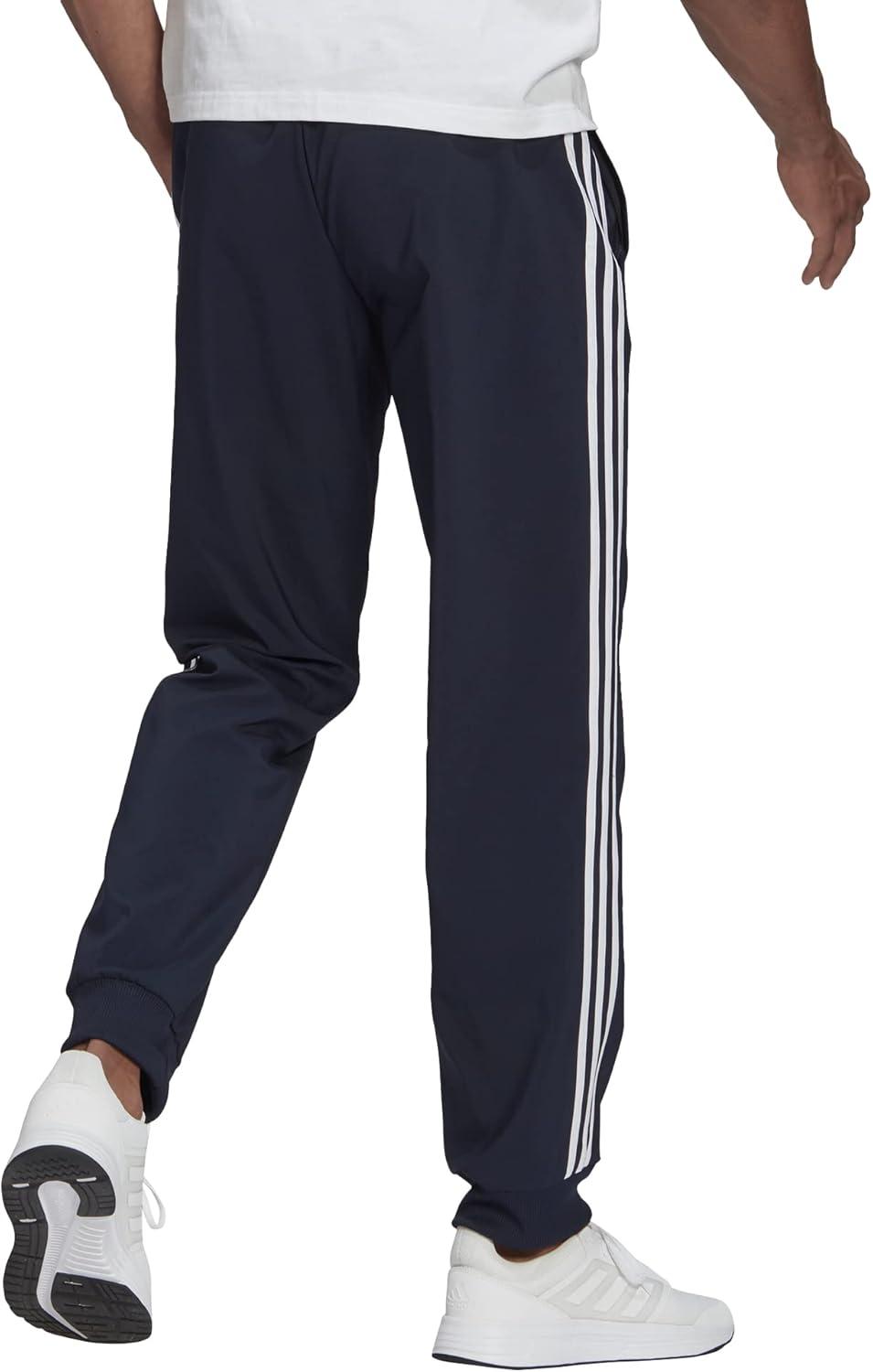 imageadidas Mens Aeroready Essentials Tapered Cuff Woven 3Stripes PantsLegend Ink