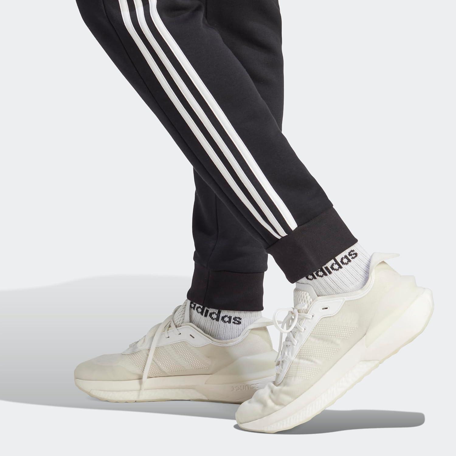 imageadidas Mens Essentials 3Stripes Fleece Tapered Cuff PantsBlack  White