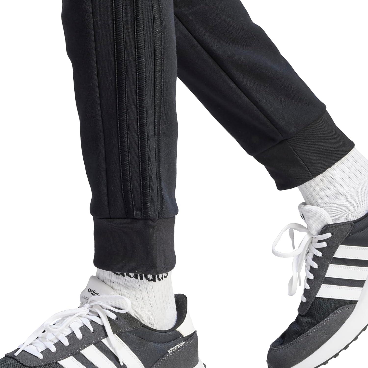 imageadidas Mens Essentials 3Stripes Fleece Tapered Cuff PantsBlackBlack
