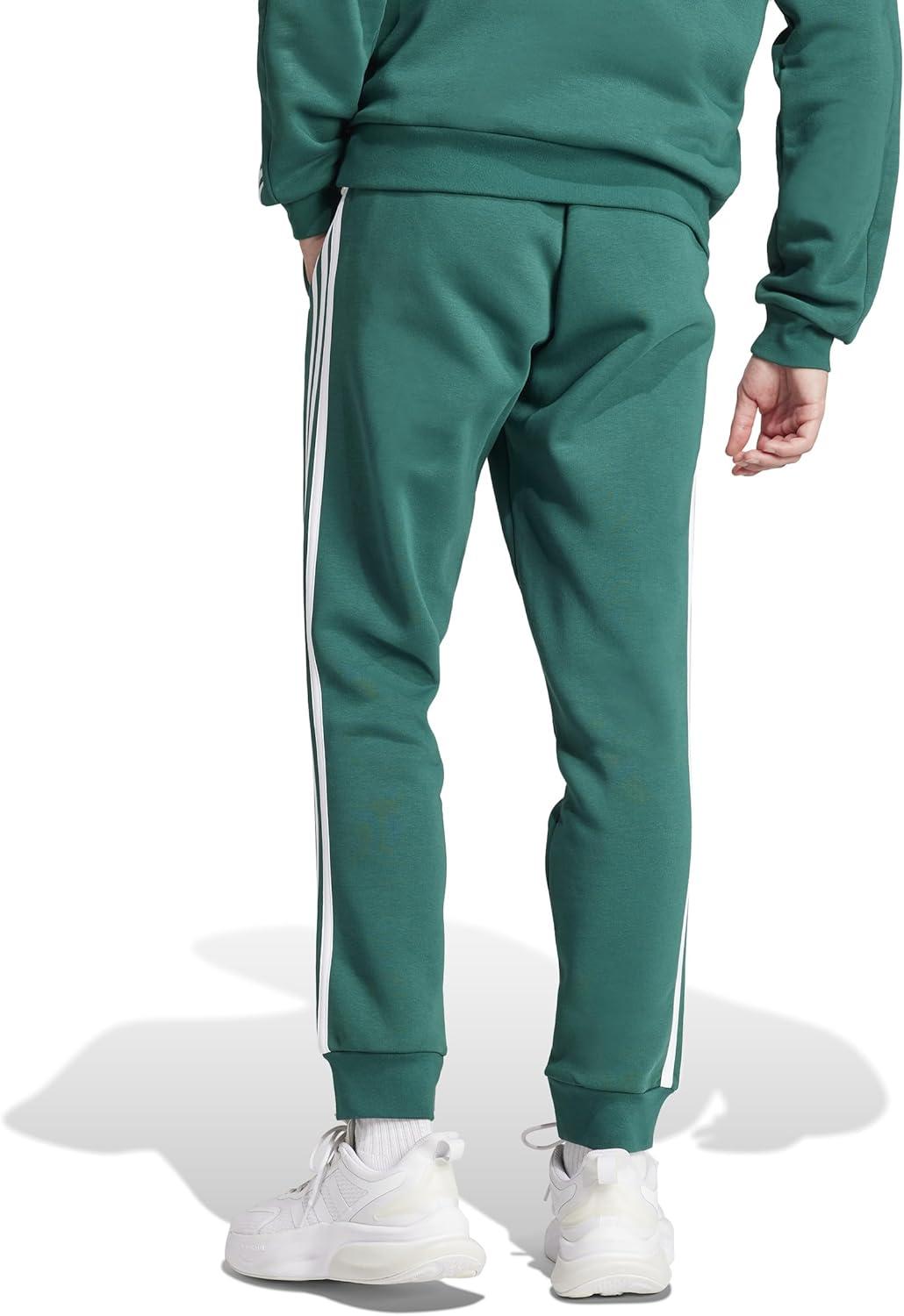 imageadidas Mens Essentials 3Stripes Fleece Tapered Cuff PantsCollegiate Green