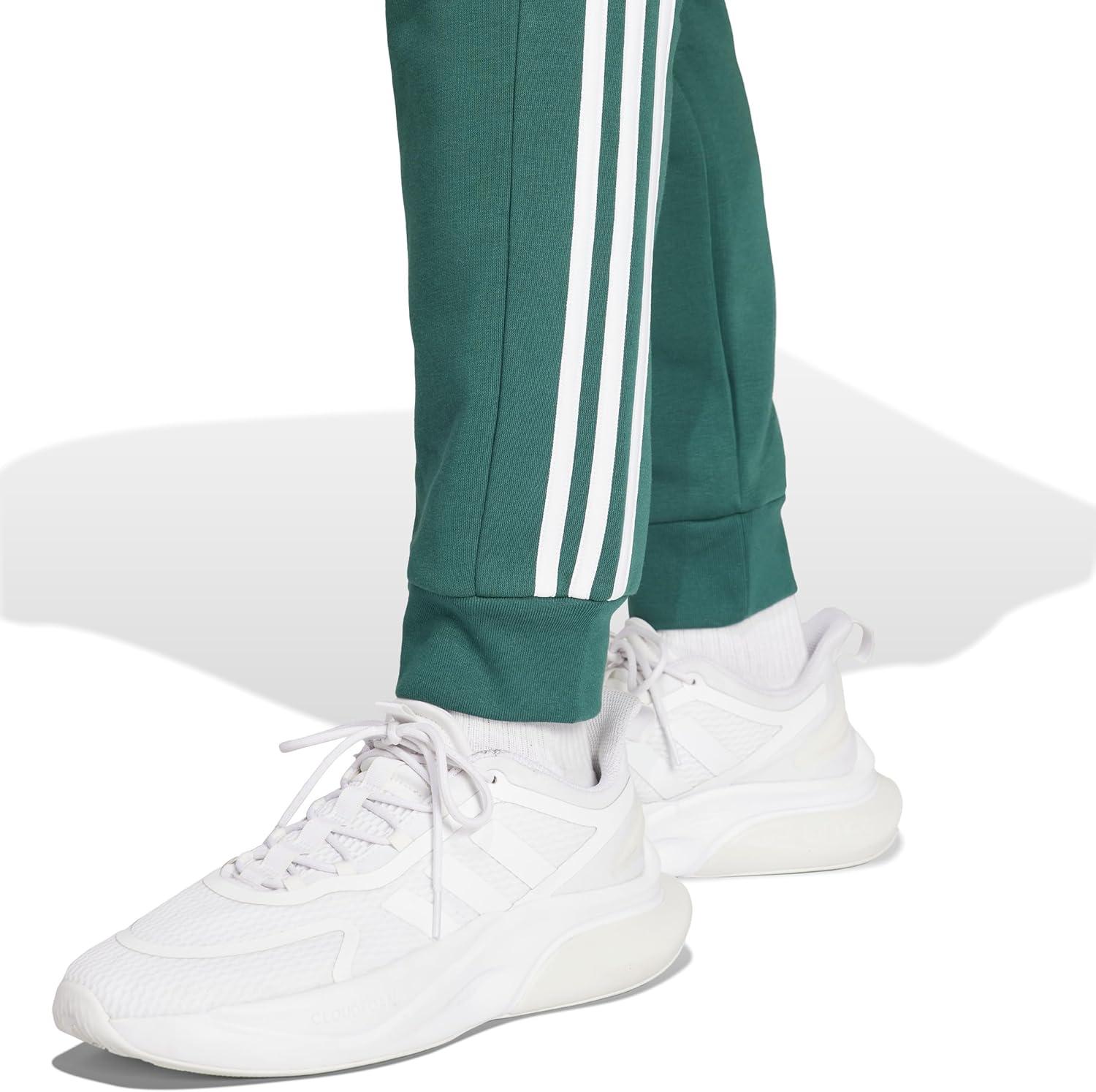 imageadidas Mens Essentials 3Stripes Fleece Tapered Cuff PantsCollegiate Green
