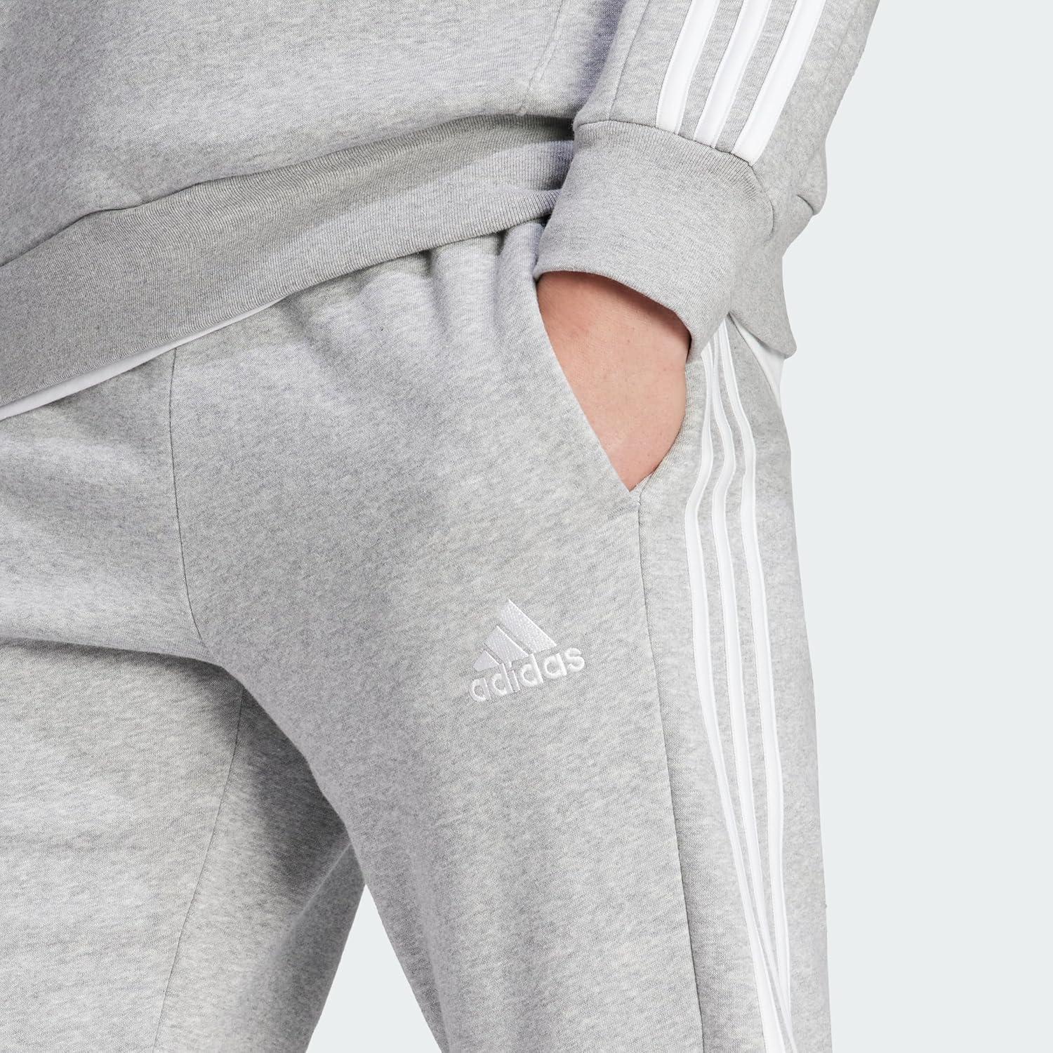 imageadidas Mens Essentials 3Stripes Fleece Tapered Cuff PantsMedium Grey Heather