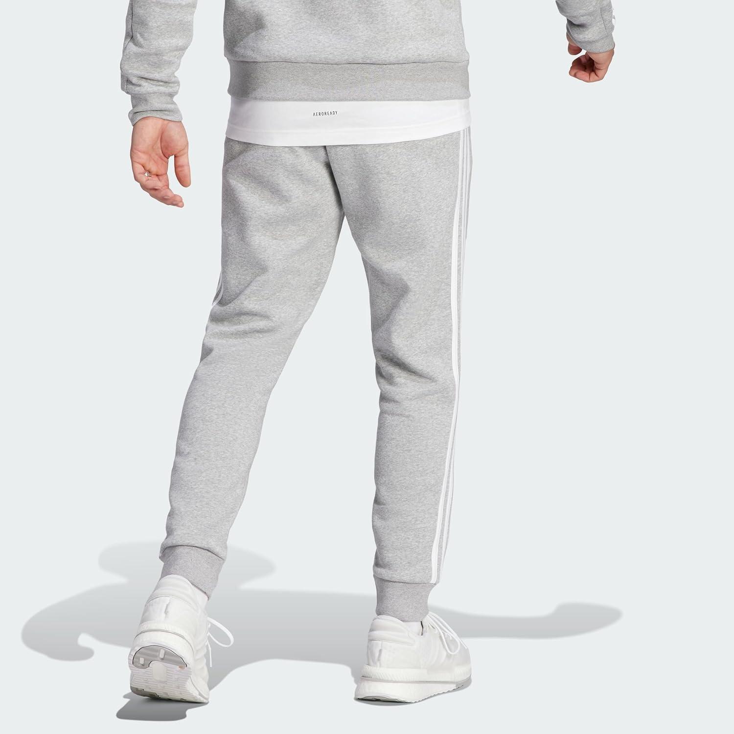 imageadidas Mens Essentials 3Stripes Fleece Tapered Cuff PantsMedium Grey Heather