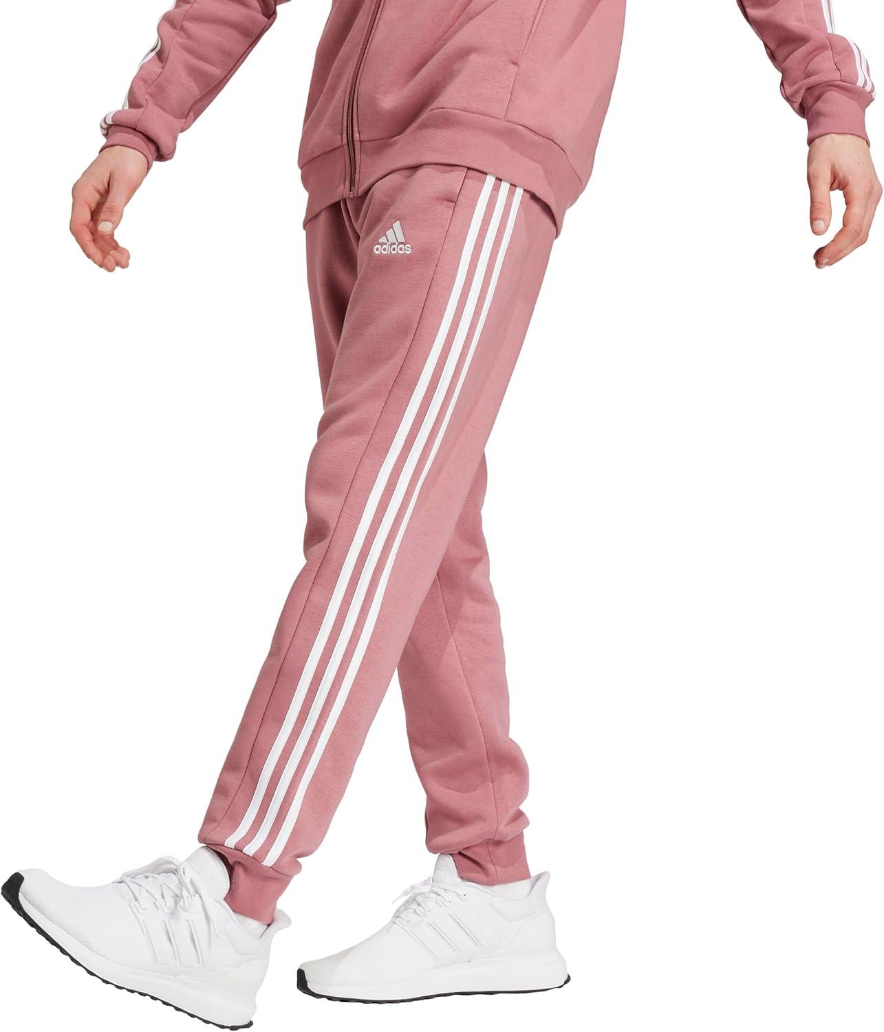 imageadidas Mens Essentials 3Stripes Fleece Tapered Cuff PantsPreloved Crimson