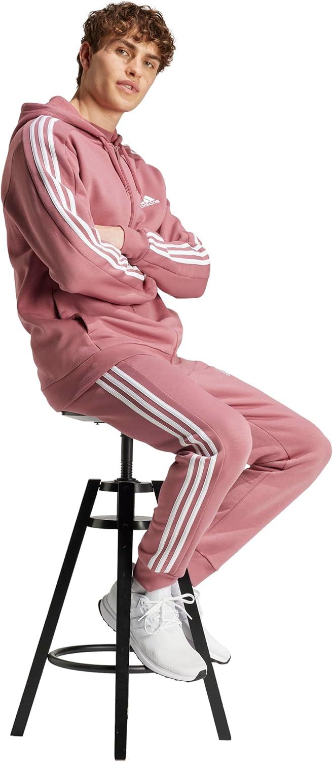 imageadidas Mens Essentials 3Stripes Fleece Tapered Cuff PantsPreloved Crimson
