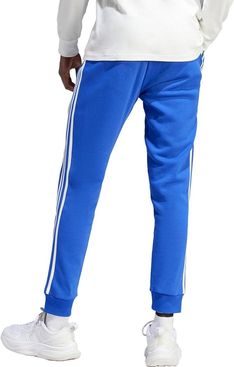 imageadidas Mens Essentials 3Stripes Fleece Tapered Cuff PantsSemi Lucid Blue