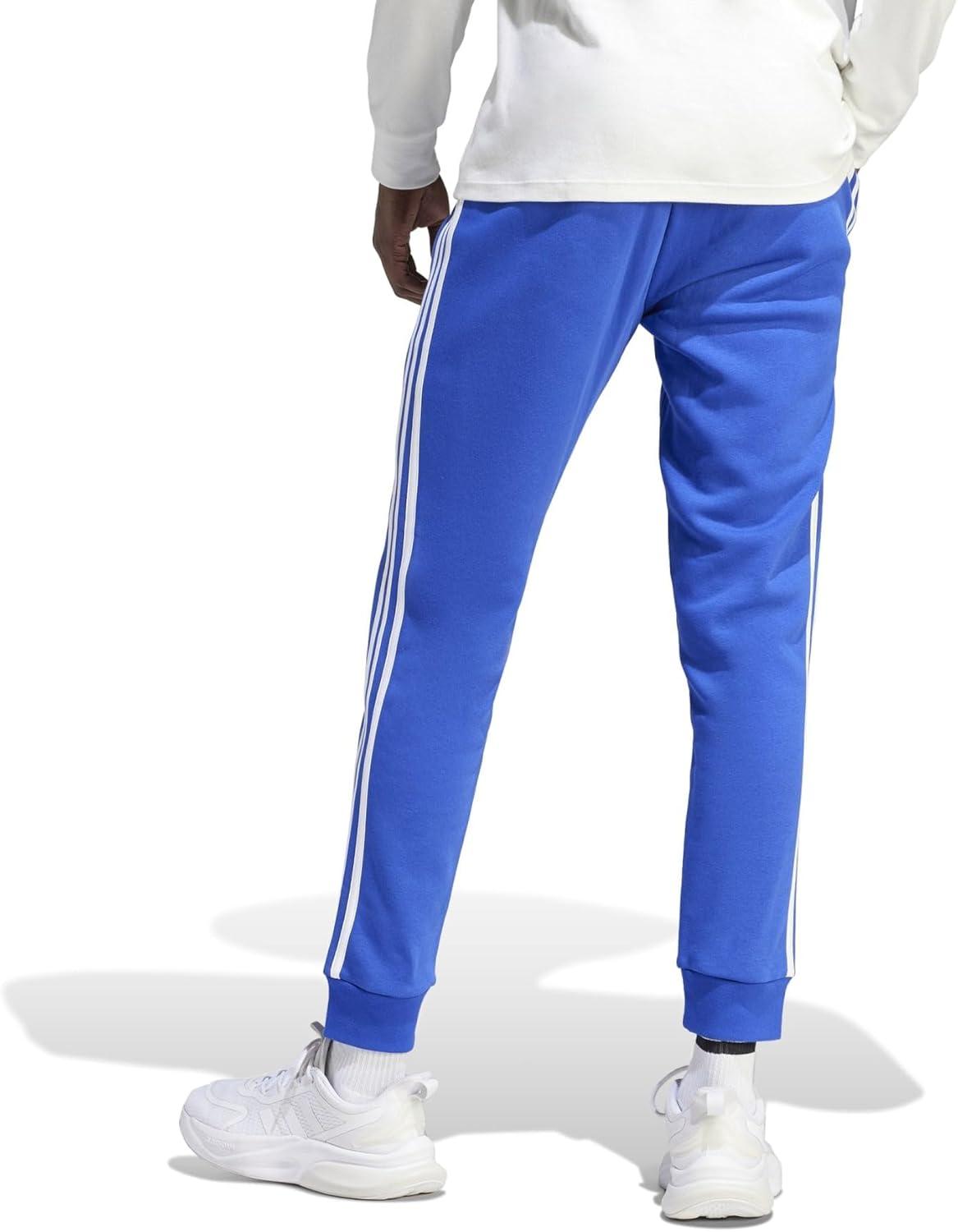 imageadidas Mens Essentials 3Stripes Fleece Tapered Cuff PantsSemi Lucid Blue