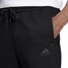 imageadidas Mens Essentials 3Stripes Fleece Tapered Cuff PantsBlackBlackBlack