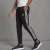 imageadidas Mens Essentials 3Stripes Fleece Tapered Cuff PantsBlackWhite