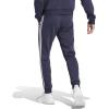 imageadidas Mens Essentials 3Stripes Fleece Tapered Cuff PantsLegend Ink