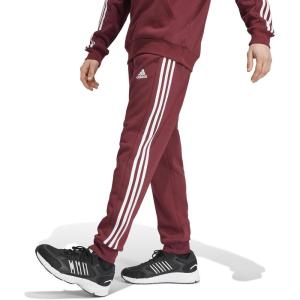 imageadidas Mens Essentials 3Stripes Fleece Tapered Cuff PantsShadow Red