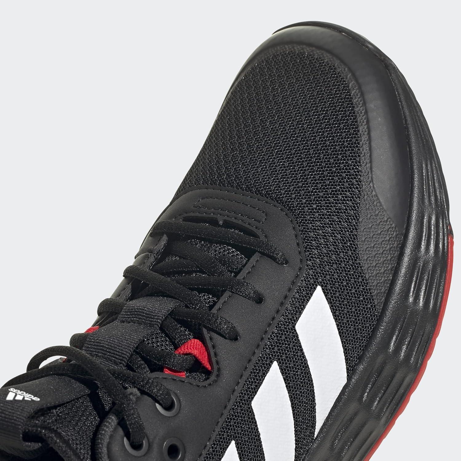 imageadidas Mens Ownthegame Basketball ShoeBlackWhiteCarbon