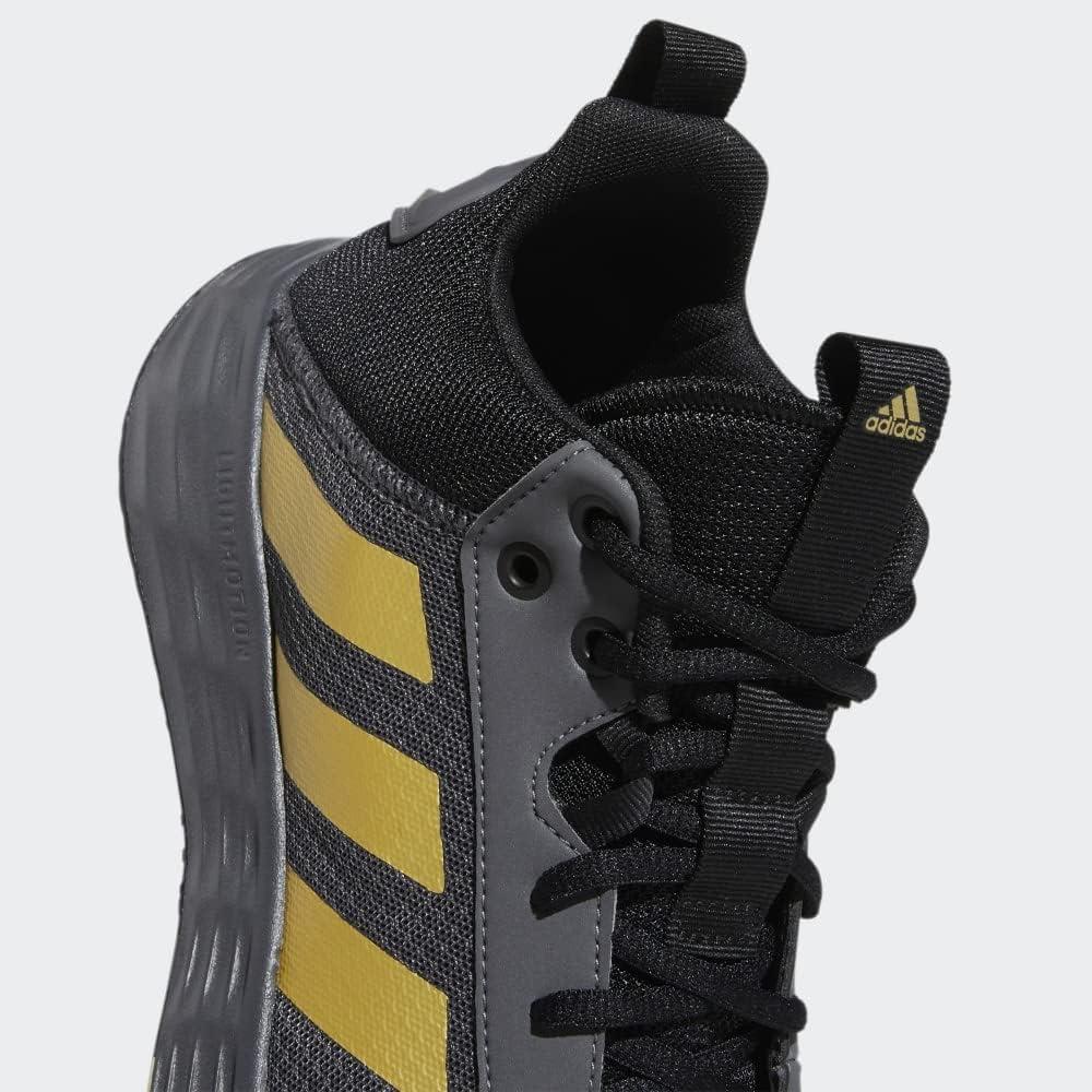 imageadidas Mens Ownthegame Basketball ShoeGrey Five Matte Gold Core Black