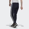 imageadidas Womens Essentials Warmup 3Stripes Slim Tapered Track PantsLegend Ink